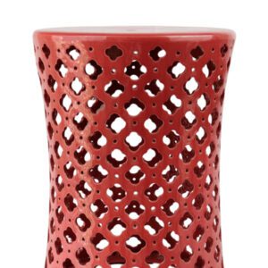 Banco decorativo de cerâmica vazado na cor vermelha com acabamento brilhante. Uma peça charmosa que agrega cor, textura e estilo à decoração.